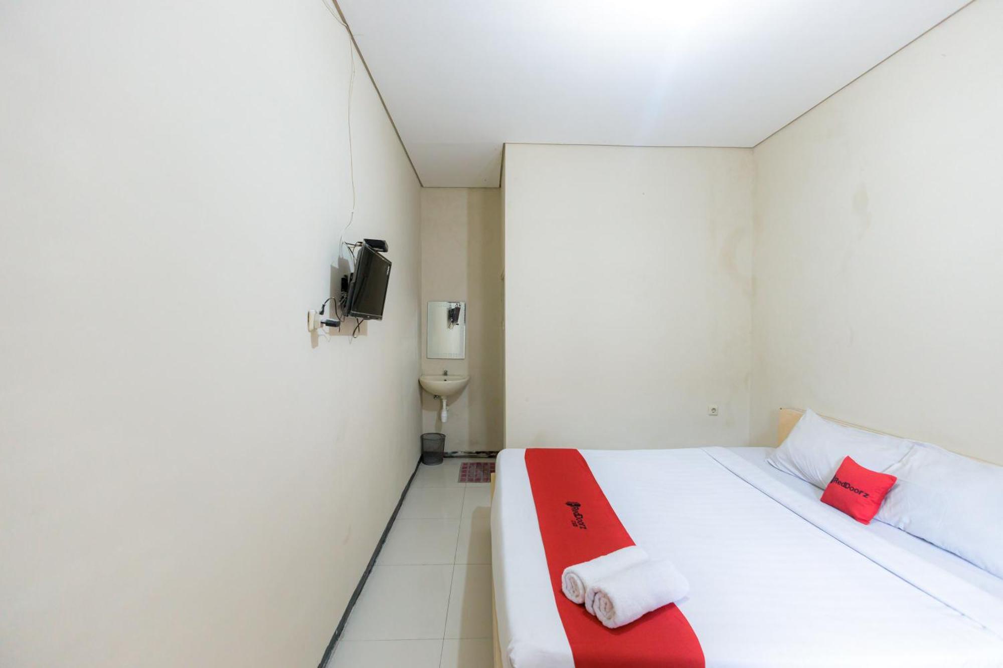 Reddoorz At Osuko Residence Sukomanunggal Jaya Сурабая Экстерьер фото